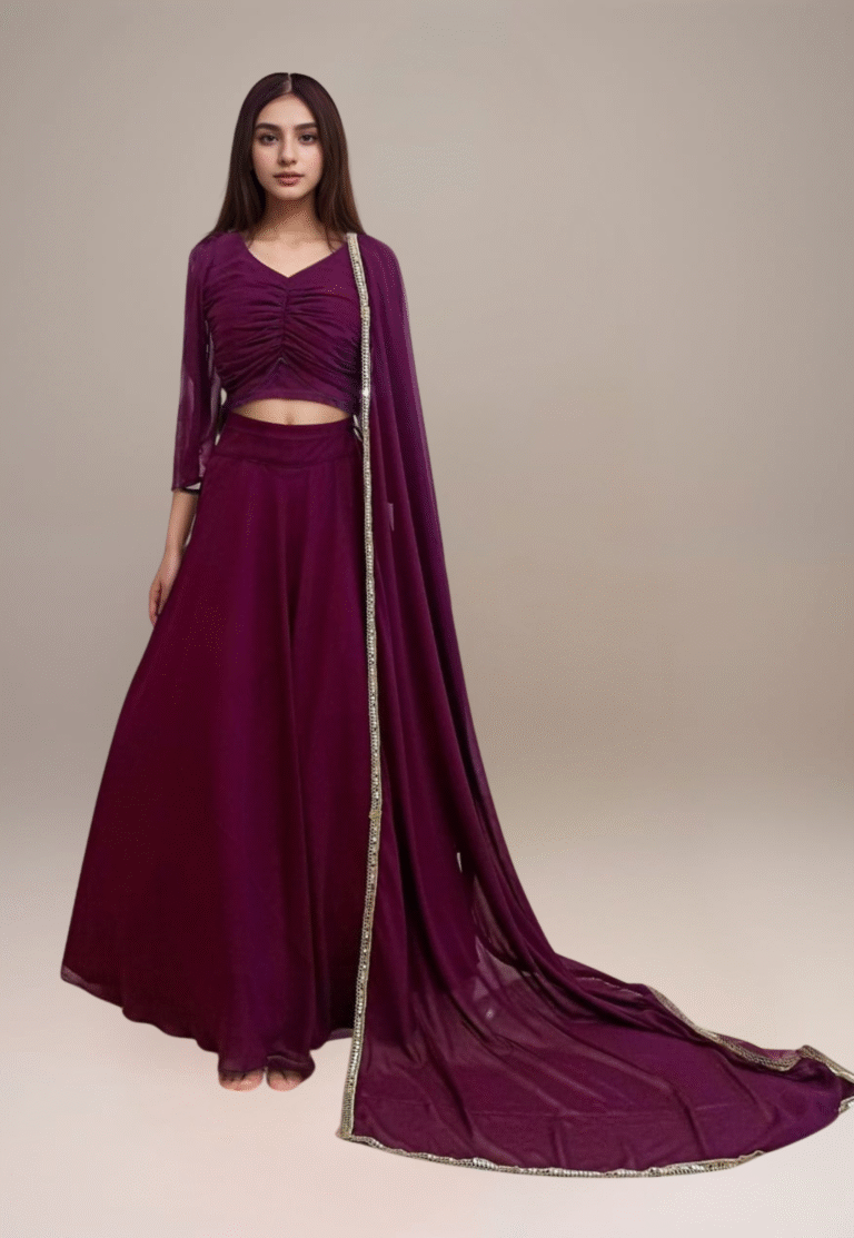 A woman wear a purple colour crop top with finishing striching design