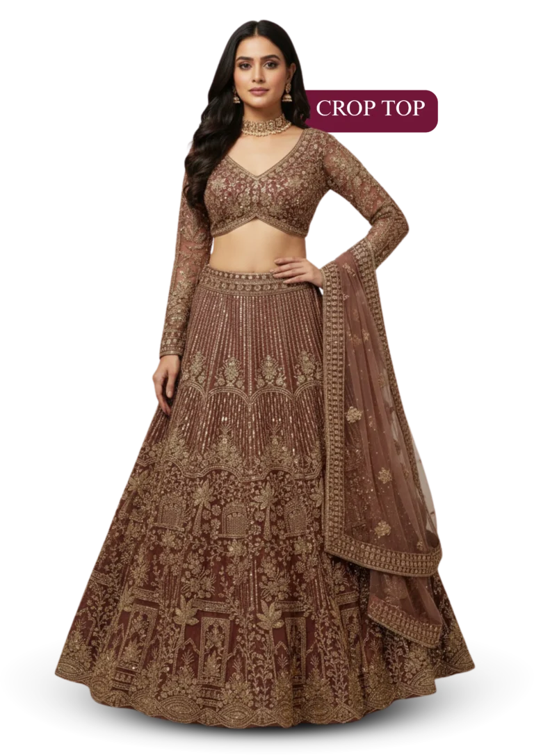 Woman in brown embroidered crop top lehenga with full sleeves, dupatta and traditional wedding wear look.